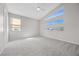 Bright bedroom with modern ceiling fan and clerestory windows offering stunning views at 13 Scenic Terrain Ave, Henderson, NV 89011