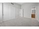 Bedroom featuring neutral paint, carpet flooring, and closet at 13 Scenic Terrain Ave, Henderson, NV 89011