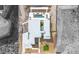 Modern home aerial view showcasing a rooftop pool, manicured landscaping, and scenic surroundings at 1455 Macdonald Ranch Dr, Henderson, NV 89012