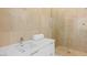 Bathroom vanity featuring a modern sink, counter space, and glass-enclosed shower for convenience at 1455 Macdonald Ranch Dr, Henderson, NV 89012