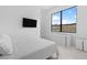A minimalist bedroom featuring clean lines, natural light, and neutral tones for comfort and style at 1455 Macdonald Ranch Dr, Henderson, NV 89012