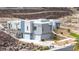 Contemporary home with hillside landscaping and dual garage at 1455 Macdonald Ranch Dr, Henderson, NV 89012
