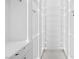 An empty, well-lit walk-in closet with shelving and drawers for ample storage at 1455 Macdonald Ranch Dr, Henderson, NV 89012