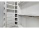 Walk-in closet with built in shelves and drawers providing ample storage space at 1700 Brock Ct, Las Vegas, NV 89117