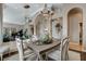Open-concept living space with a formal dining area and grand piano at 1700 Brock Ct, Las Vegas, NV 89117