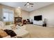 Spacious living room with a fireplace, comfortable seating, and ample natural light at 1700 Brock Ct, Las Vegas, NV 89117