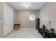 Mud room with tile flooring, natural lighting, shoe rack, storage, and an exterior entrance at 1700 Brock Ct, Las Vegas, NV 89117