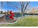 View of the community playground and tennis court, perfect for recreational activities at 1700 Brock Ct, Las Vegas, NV 89117