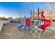 Community playground featuring colorful slides, climbing structures and soft landing for safe fun at 1700 Brock Ct, Las Vegas, NV 89117