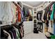 Spacious walk-in closet with custom shelving, drawers, and ample storage space for clothes and accessories at 1700 Brock Ct, Las Vegas, NV 89117