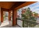 Balcony with metal railing overlooking trees and community landscape at 23 E Agate Ave # 303, Las Vegas, NV 89123