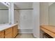 Bathroom featuring shower-tub, vanity with sink and extra seat with mirror on the side at 23 E Agate Ave # 303, Las Vegas, NV 89123