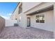 Spacious back patio offers a private outdoor living space, perfect for relaxation and entertaining at 234 Walsh Peak Ave, Henderson, NV 89015