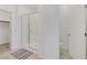 Bathroom featuring a walk-in shower and toilet, seamlessly connected to the walk-in closet at 234 Walsh Peak Ave, Henderson, NV 89015