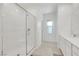 Modern bathroom features a glass enclosed shower with white subway tile at 234 Walsh Peak Ave, Henderson, NV 89015