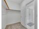 Walk-in closet leads to the bathroom featuring a shower with glass door at 234 Walsh Peak Ave, Henderson, NV 89015