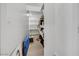 Walk-in closet with built-in shelving and clothing racks at 234 Walsh Peak Ave, Henderson, NV 89015
