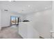 Bright living room with sliding glass doors to a balcony, offering natural light and indoor-outdoor flow at 234 Walsh Peak Ave, Henderson, NV 89015