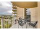 Cozy balcony offers space for outdoor dining with views of the city at 3111 Bel Air Dr # 15D, Las Vegas, NV 89109