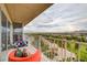 A lovely balcony with stylish seating options overlooks the city and distant mountains at 3111 Bel Air Dr # 15D, Las Vegas, NV 89109