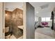 Hallway view of a well-appointed half-bathroom and living space with city views at 3111 Bel Air Dr # 15D, Las Vegas, NV 89109