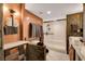 Contemporary bathroom with a glass shower and modern fixtures at 3111 Bel Air Dr # 15D, Las Vegas, NV 89109
