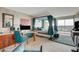 Inviting bedroom with a canopy bed, a desk area, and city views from the large window at 3111 Bel Air Dr # 15D, Las Vegas, NV 89109