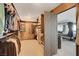 Spacious walk-in closet with custom shelving and hanging racks, offering ample storage space at 3111 Bel Air Dr # 15D, Las Vegas, NV 89109