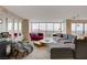 Comfortable living room with large windows offering stunning mountain views and stylish seating at 3111 Bel Air Dr # 15D, Las Vegas, NV 89109