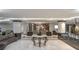 Well-lit lobby with marble floors, ornate table centerpiece, decorative columns, and modern art at 3111 Bel Air Dr # 15D, Las Vegas, NV 89109
