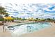 Large swimming pool, palm trees and yellow shade umbrellas offer a pleasant relaxing retreat at 3111 Bel Air Dr # 15D, Las Vegas, NV 89109