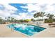 Community pool with blue water and ladder; lounge chairs and yellow umbrellas scattered throughout at 3111 Bel Air Dr # 15D, Las Vegas, NV 89109