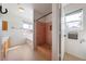 Well-lit bathroom with a separate shower, bathtub, and tile flooring at 3581 Ranger Way, Pahrump, NV 89048