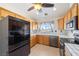 Kitchen featuring stainless appliances and oak cabinetry at 3581 Ranger Way, Pahrump, NV 89048