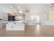 Open kitchen and living area with island and bar seating at 3581 Ranger Way, Pahrump, NV 89048