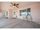 Covered patio featuring a ceiling fan and neutral furniture, offering a comfortable outdoor living space at 3581 Ranger Way, Pahrump, NV 89048