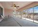 Enclosed sunroom with ceiling fan and view of the backyard at 3581 Ranger Way, Pahrump, NV 89048