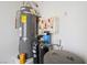 Residential water heater with associated water filtration equipment in a utility room at 3581 Ranger Way, Pahrump, NV 89048