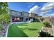 Enjoy the beautifully landscaped backyard, complete with a hot tub and outdoor seating area at 394 Red Feather Peak Ct, Las Vegas, NV 89138