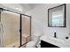 Modern bathroom with a glass-enclosed shower, sleek vanity, and contemporary fixtures at 394 Red Feather Peak Ct, Las Vegas, NV 89138