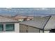 Enjoy the city view and mountains, with the skyline visible behind neighborhood roofs at 394 Red Feather Peak Ct, Las Vegas, NV 89138