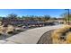 Entrance to Stonebridge Park with a wide concrete pathway at 394 Red Feather Peak Ct, Las Vegas, NV 89138