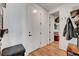 Functional entryway with storage bench and coat rack providing a welcoming and organized space at 394 Red Feather Peak Ct, Las Vegas, NV 89138
