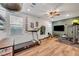 Well-equipped exercise room with treadmill, weights, and TV for a complete workout experience at 394 Red Feather Peak Ct, Las Vegas, NV 89138