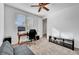 Home office / bedroom featuring a bed/couch, desk and lots of natural light at 394 Red Feather Peak Ct, Las Vegas, NV 89138