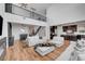 Spacious living room with an open floor plan and stylish furnishings at 394 Red Feather Peak Ct, Las Vegas, NV 89138