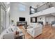Spacious living room has soaring ceilings, a fireplace, and ample seating at 394 Red Feather Peak Ct, Las Vegas, NV 89138