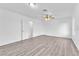 Large bonus room boasting wood-look flooring, a fan, and a window at 3946 Torsby Pl # 3946, Las Vegas, NV 89119