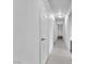 Hallway featuring neutral paint and light tile flooring at 3946 Torsby Pl # 3946, Las Vegas, NV 89119