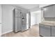 Updated kitchen offers stainless steel appliances, ample storage, and an open view to the living area at 3946 Torsby Pl # 3946, Las Vegas, NV 89119